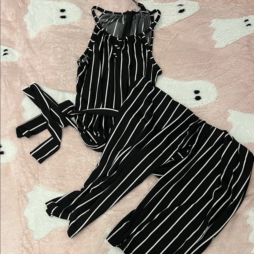 NWT! Stylish black and white jumpsuit. Size M